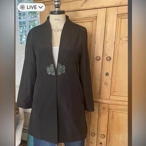 Beautiful simple jacket with Chinese jade-like closure. Size S Purchased in HK